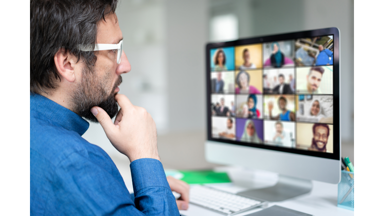 Working at home having a video conference with colleagues