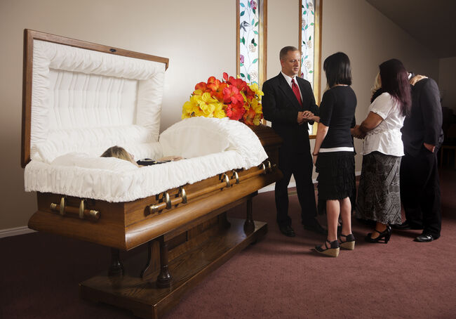 Family Receiving Guests at a Funeral