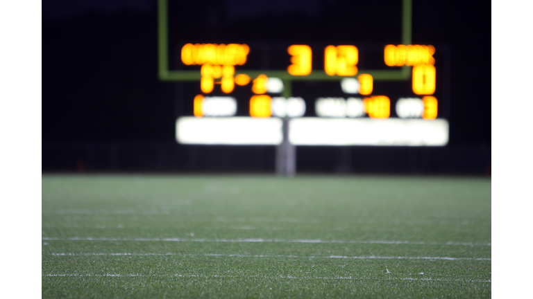 High school football score seen from distance