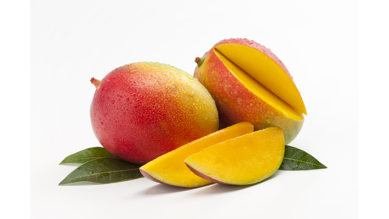 Fresh Slices of Mango on a Bed of Leaves