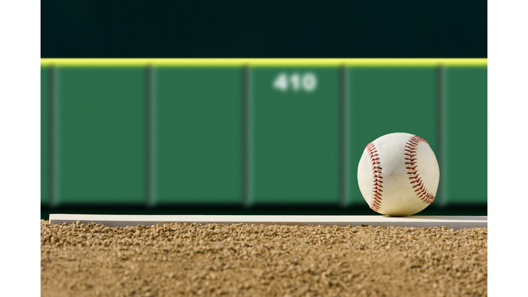 New Baseball on Pitcher's Mound, outfield wall