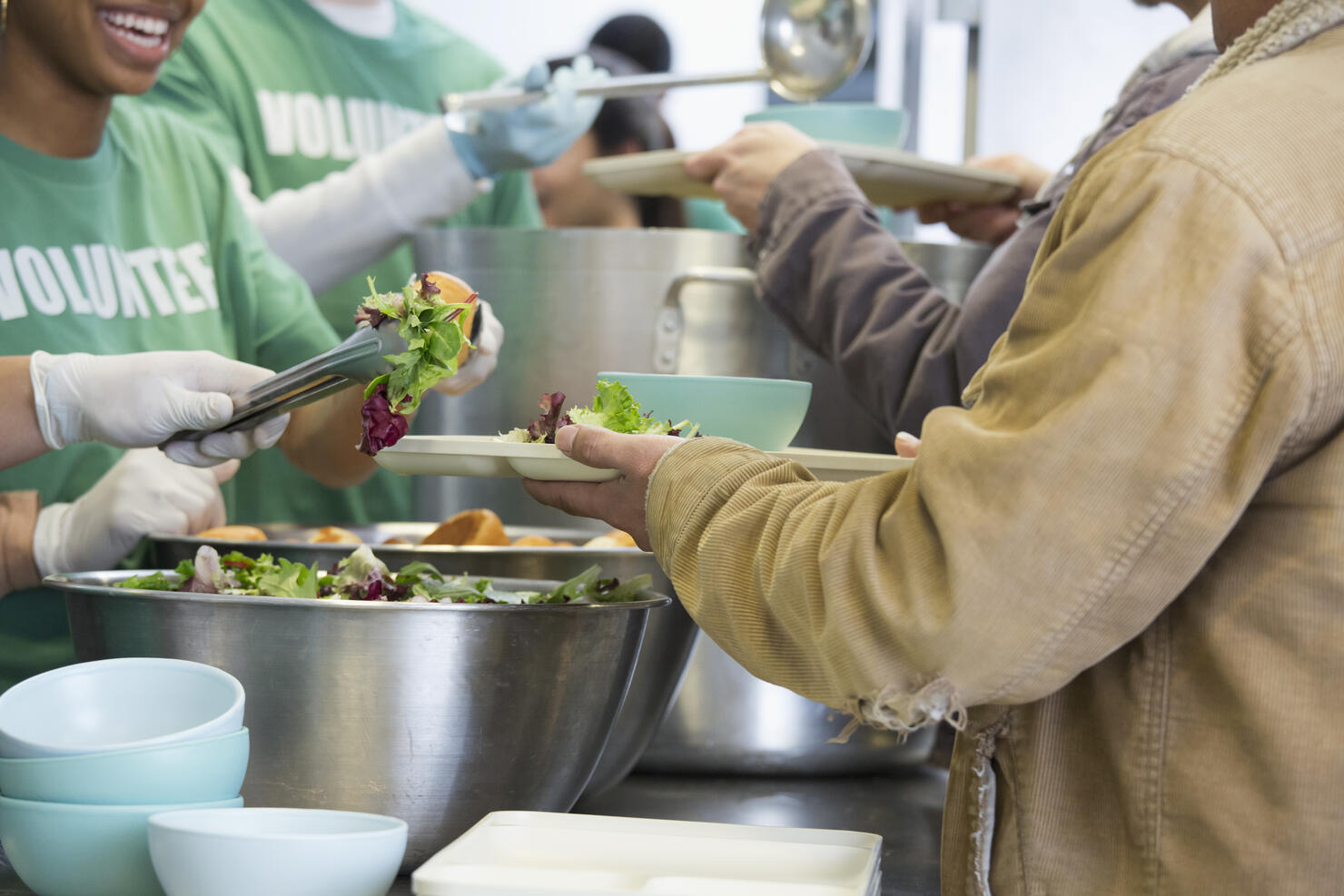 Volunteers working in soup kitchen