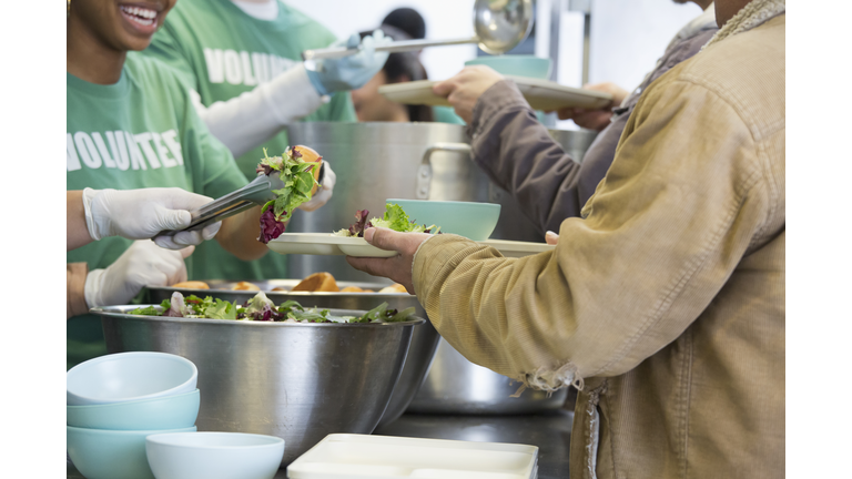 Volunteers working in soup kitchen