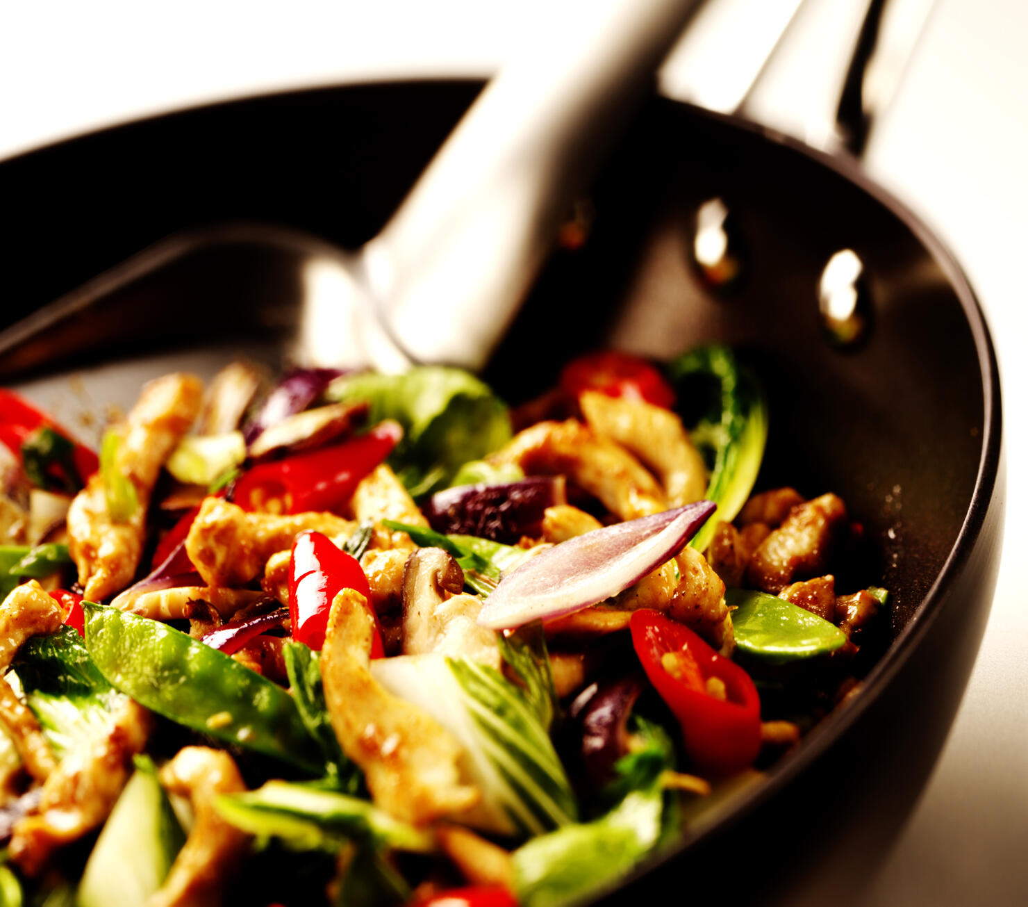 Chicken and vegetable stirfry in wok