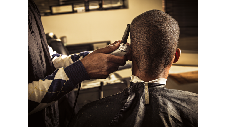 Man having haircut at barber shop