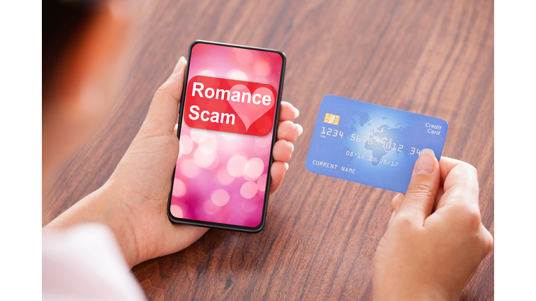 Businesswoman Making Payment On Mobile Phone