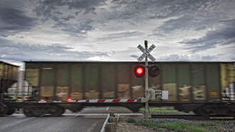Freight Train vs 18-Wheeler Hauling Cars