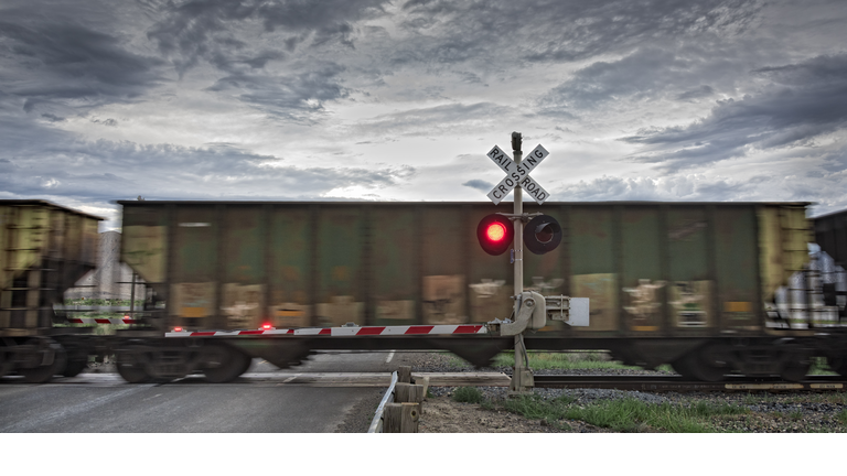 Freight train and railroad crossing
