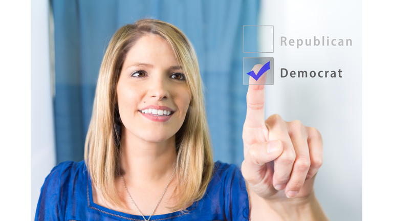 Woman chooses Democrat straight party option in voting booth