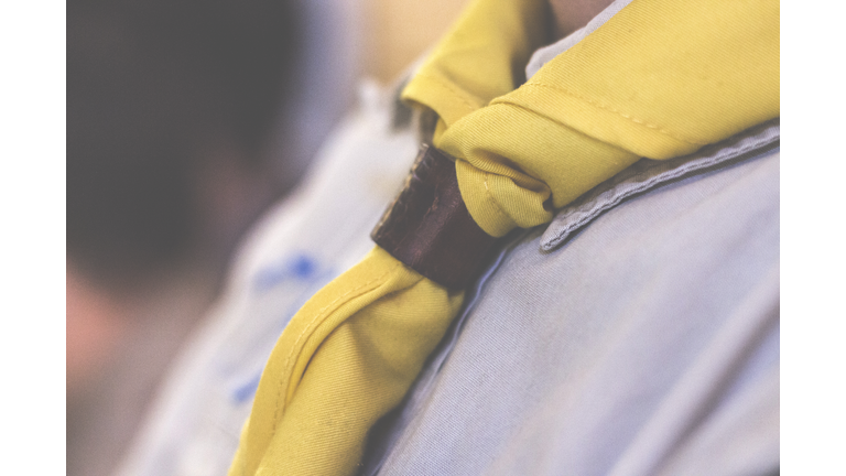 Midsection Of Boy Wearing Scout Scarf