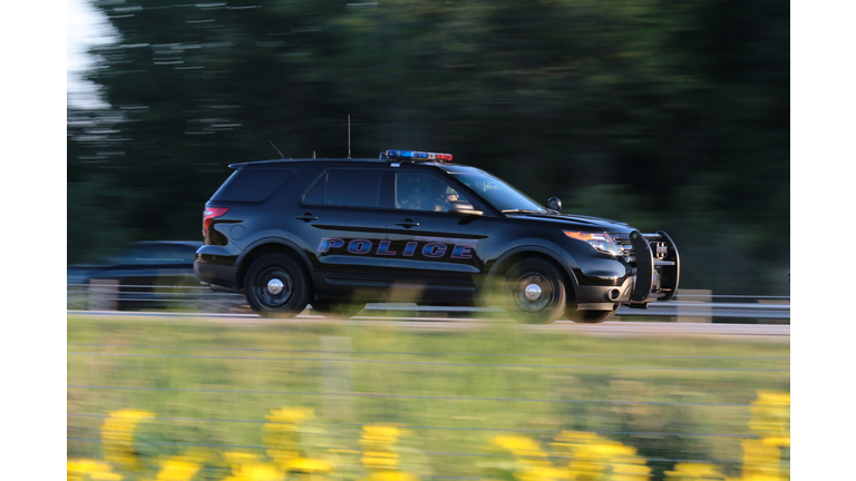 Police SUV on a rural highway