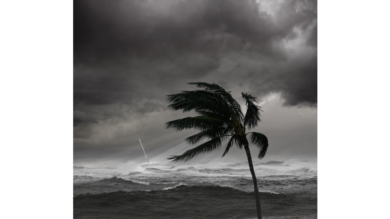 Boat on ocean in tropical storm