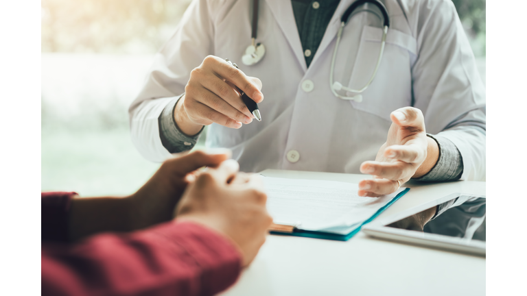 Doctor talking to the patient about menopause and treatment in future.