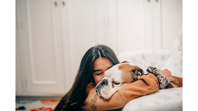 female taking care of her dog