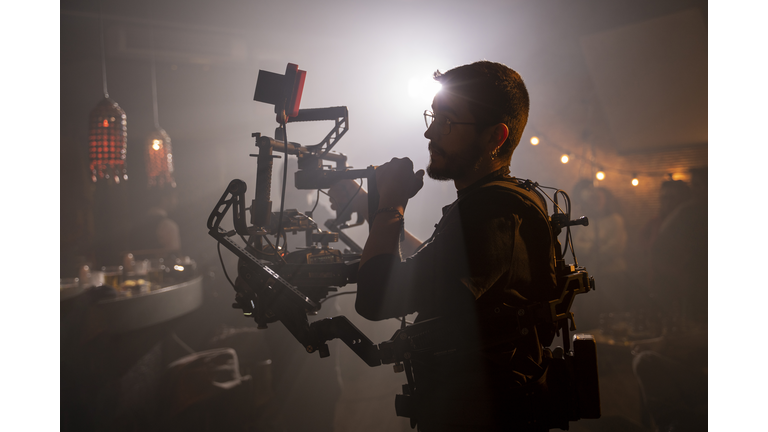 Cameraman at work on movie set