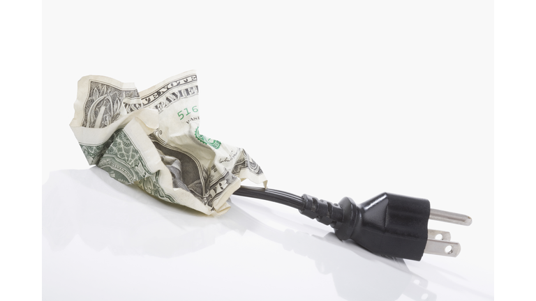 US paper currency with a three pin plug