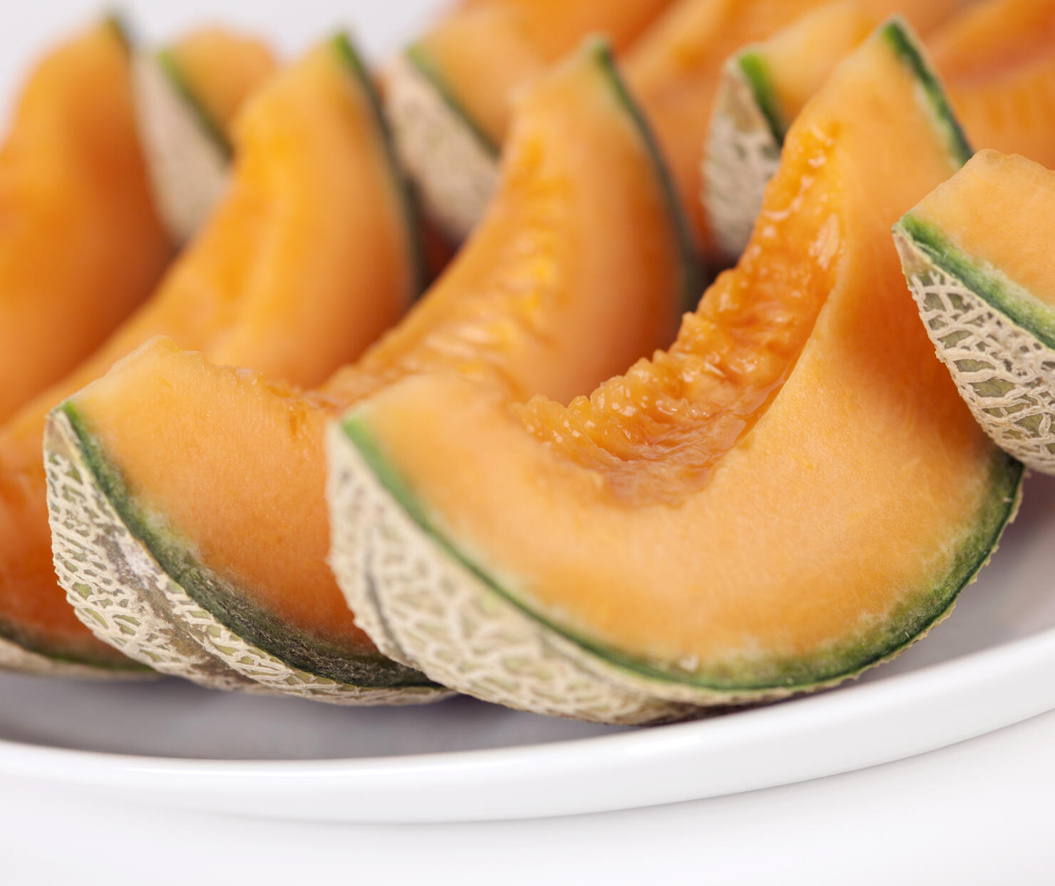 Sliced cantaloupe melons on a plate