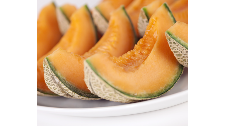 Sliced cantaloupe melons on a plate