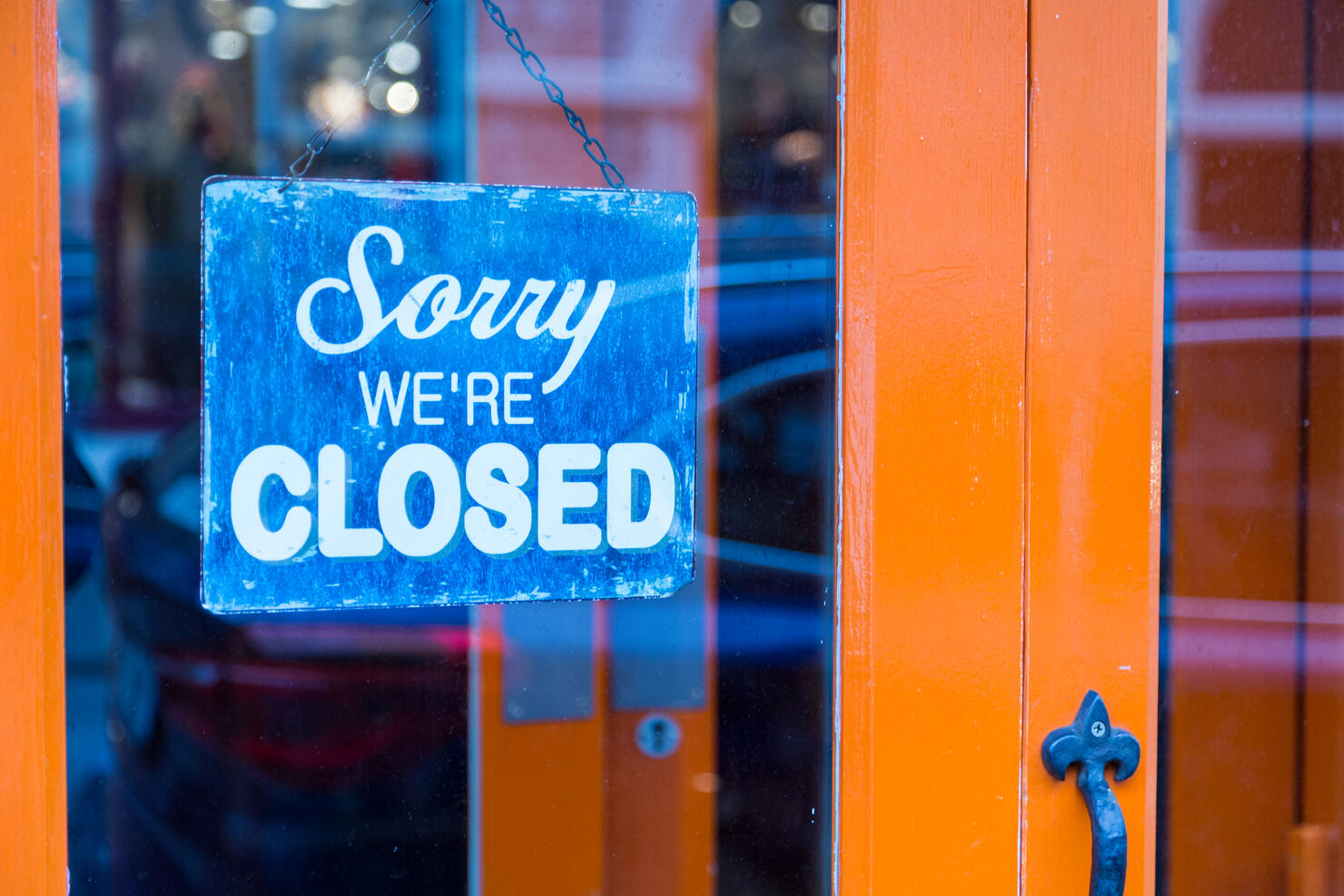 Closed sign in shop door