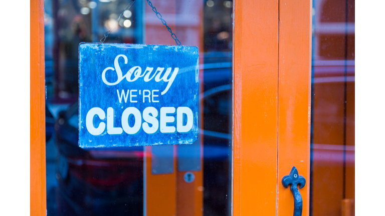 Closed sign in shop door
