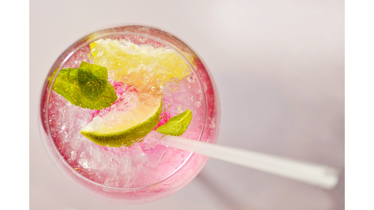 Close--Up Of Pink Cocktail On Table