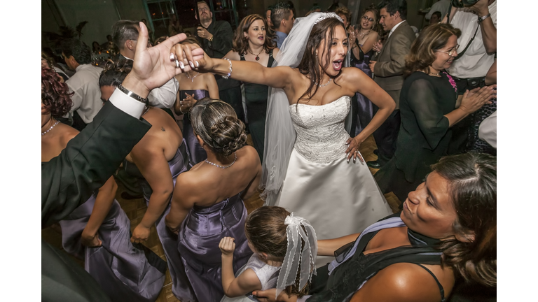 High angle view of bride and groom dancing at wedding reception