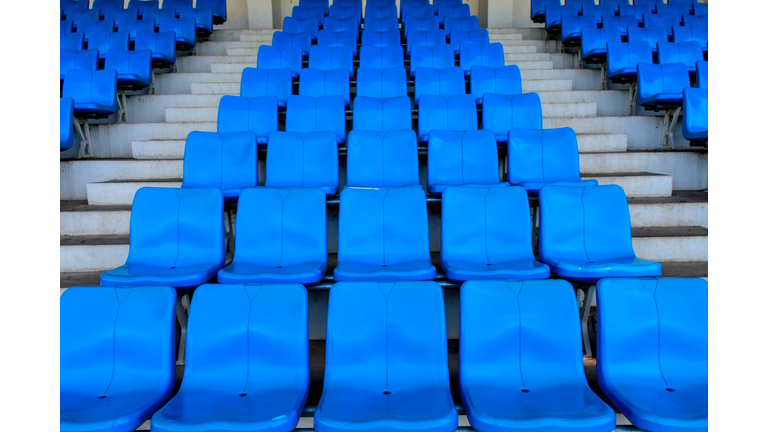 Amphitheater. Plastic Seat Rows At The Arena.