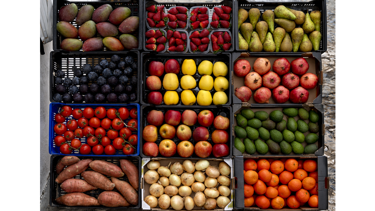 Fruits And Vegetables For Sale At Market Stall