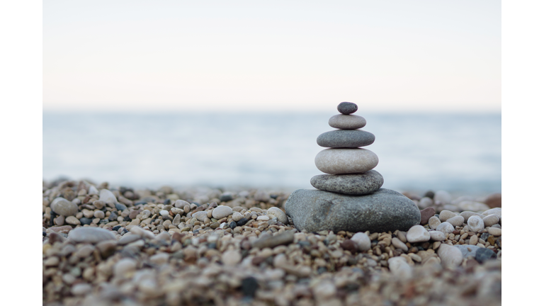 Balanced stones on a pebble beach