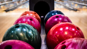 Rides A Bicycle Hangin' On To 8 Bowling Balls.  How's This End?