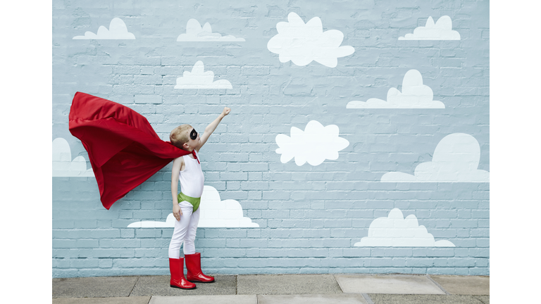 Boy dressed as a superhero