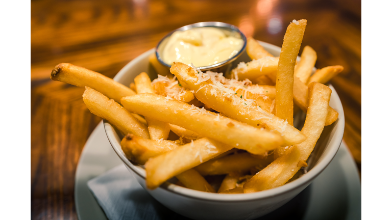 Close-up bowl of french fries with mayonnaise dipping