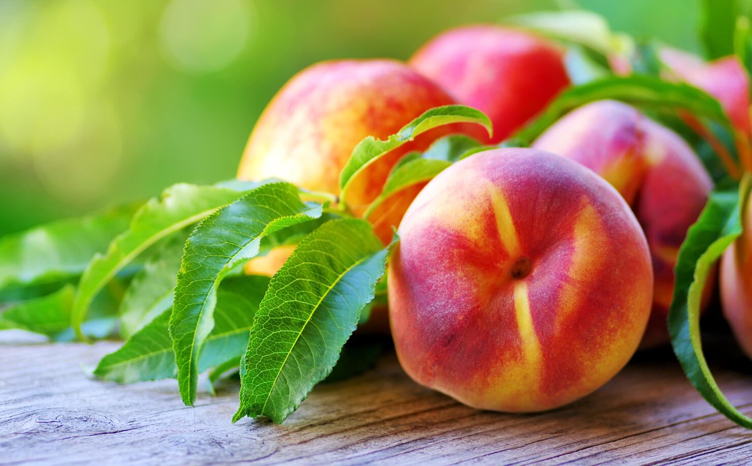 Close-Up Of Ripe Peaches On Table