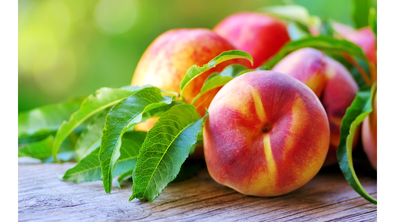 Close-Up Of Ripe Peaches On Table