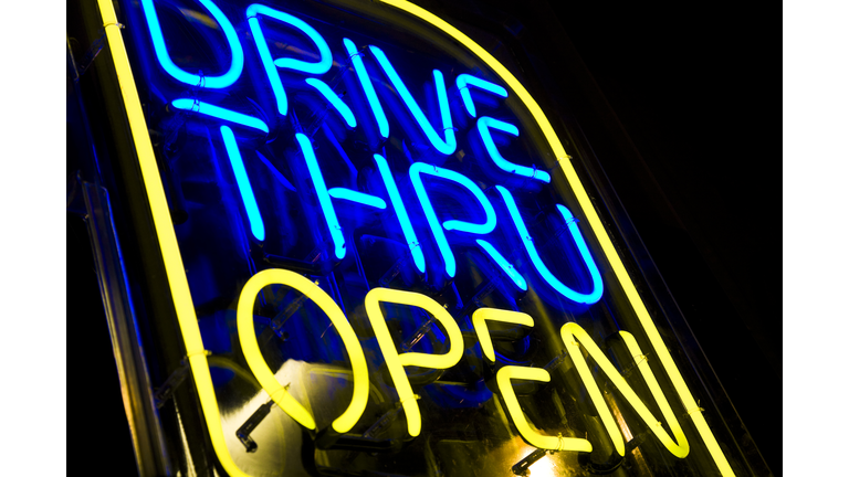 neon drive thru sign blue and yellow