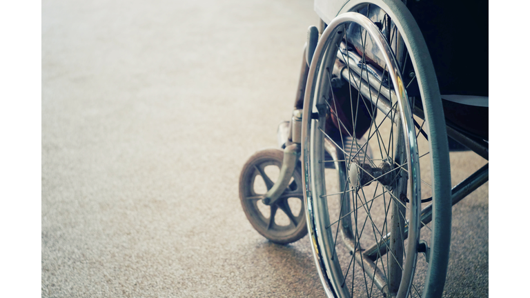 Close-Up Of Wheelchair On Road