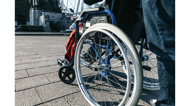 Close Up Of A Wheelchair - Urban Mobility In A Disability Status Concept