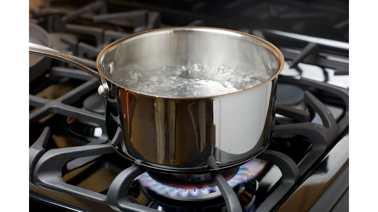 Water Boiling on a Gas Stove, stainless pot.