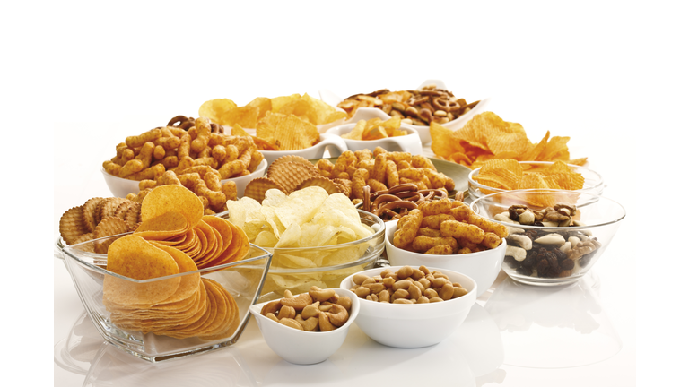 Assorted snacks in glass bowls