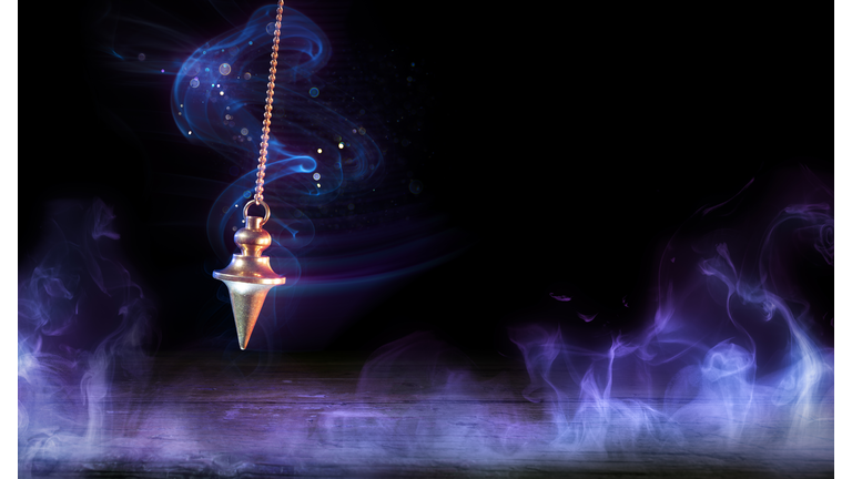 Pendulum Swinging In Magic Background - Occult Concept