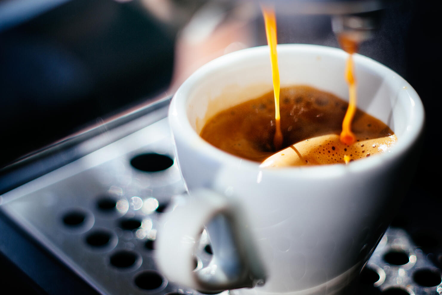 Espresso shot pouring out.
