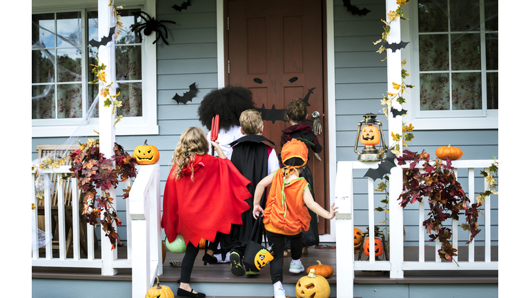 Young kids trick or treating during Halloween