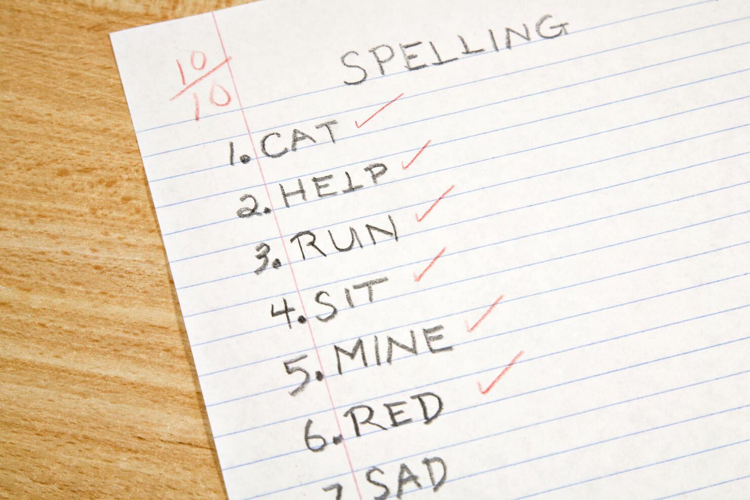 A+ elementary spelling test corrected by teacher