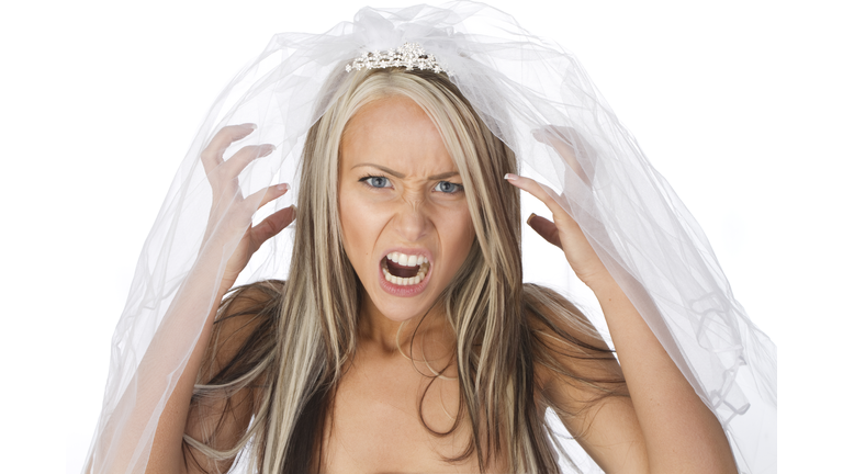 An angry woman wearing a veil, depicting a brides ills