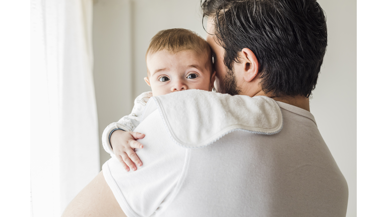 Father burping his baby