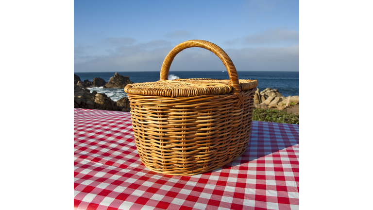 Picnic Basket on Wooden Picnic Table