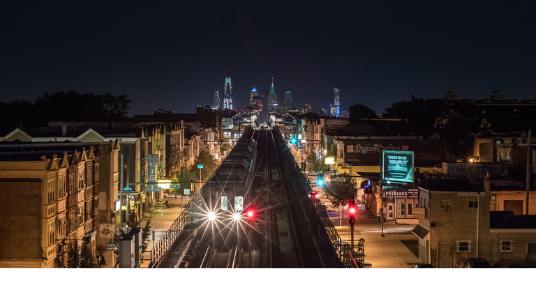 Philadelphia SEPTA Train and Night Cityscape