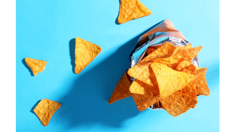 Bag chips doritos on blue background