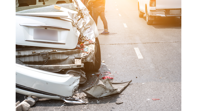 Auto accident involving two cars on a city street