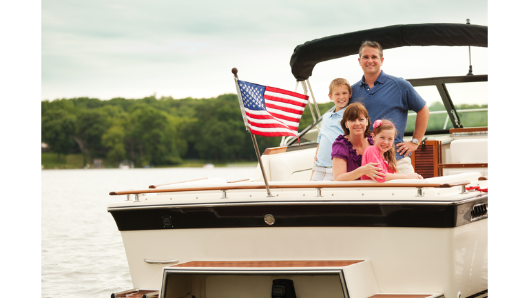 Happy, Smiling American Family Boating on Midwest Lake with Motorboat